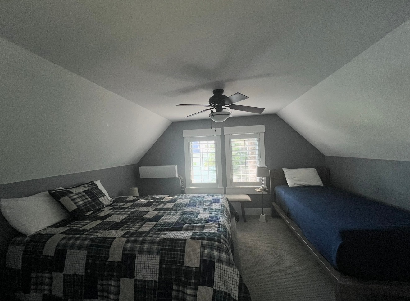 Loft bedroom with queen and twin beds on the Elm Street side