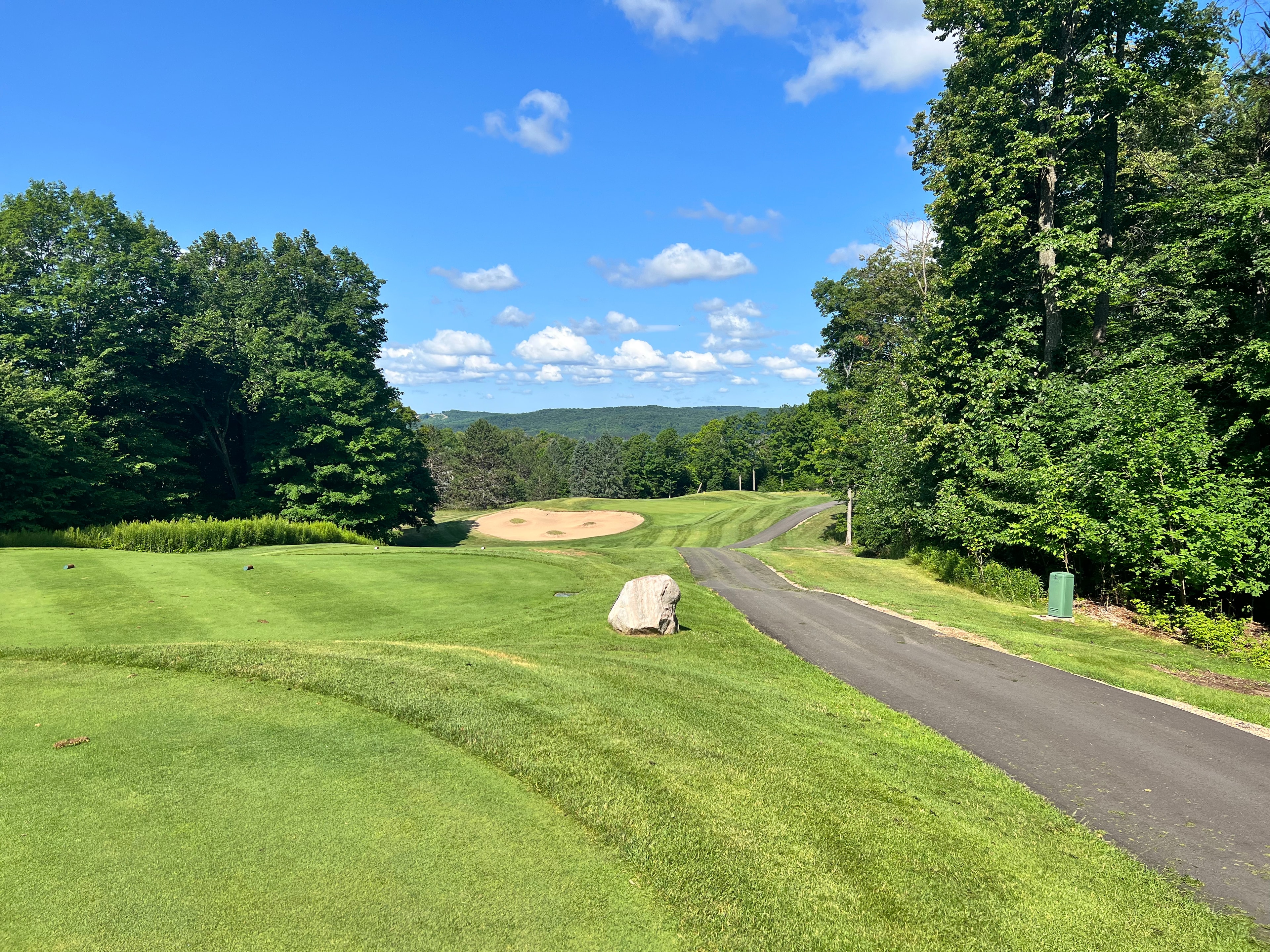 Northern Michigan golf course fairway with lake views